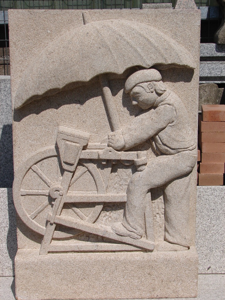Relieve Figurativo del Afilador en Granito